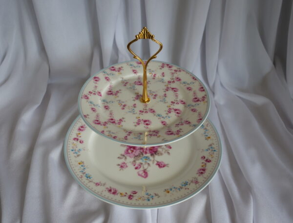 Two tier ceramic cake stand with pink floral pattern