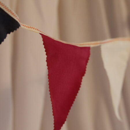 Red, white and blue material triangle bunting